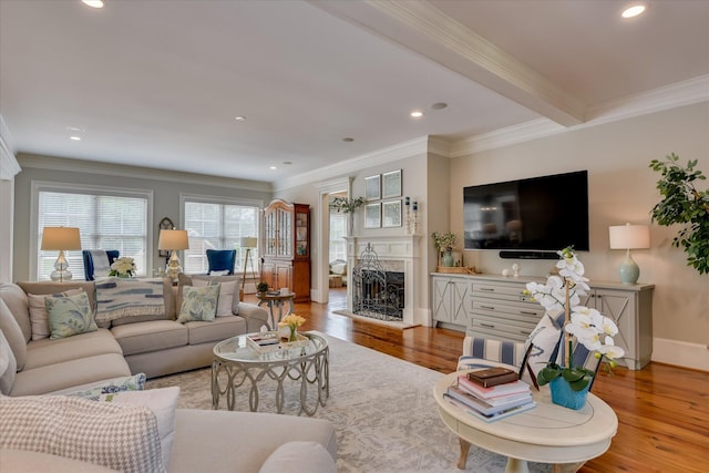 612 Emerald Xing, Evans, GA 30809 - living area with light wood finished floors, a premium fireplace, ornamental molding, and recessed lighting
