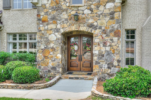612 Emerald Xing, Evans, GA 30809 - entrance to property featuring stone siding and french doors