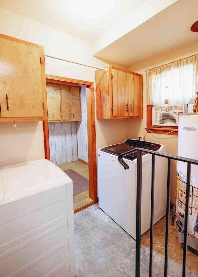 interior space featuring water heater, an AC wall unit, and washer and clothes dryer