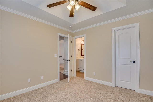 272 Harvester Dr, North Augusta, SC 29860 - unfurnished bedroom featuring carpet flooring, crown molding, ensuite bath, a raised ceiling, and a ceiling fan