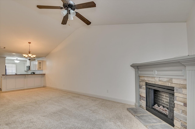 272 Harvester Dr, North Augusta, SC 29860 - unfurnished living room with a fireplace, a chandelier, carpet, ceiling fan, and vaulted ceiling