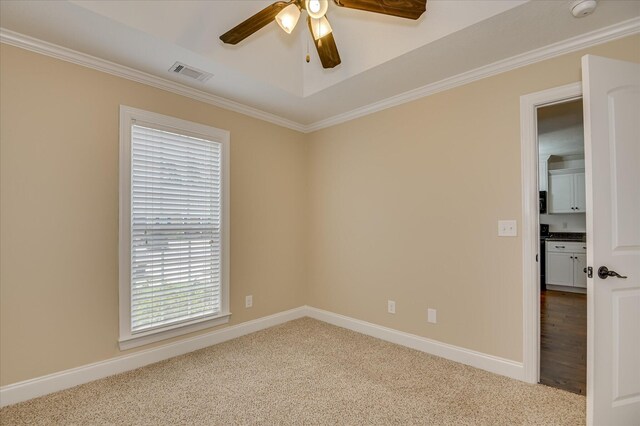 272 Harvester Dr, North Augusta, SC 29860 - carpeted empty room featuring a ceiling fan, a smoke detector, and ornamental molding