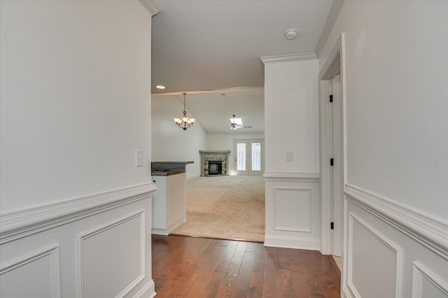 272 Harvester Dr, North Augusta, SC 29860 - hall with a chandelier and dark wood-style floors