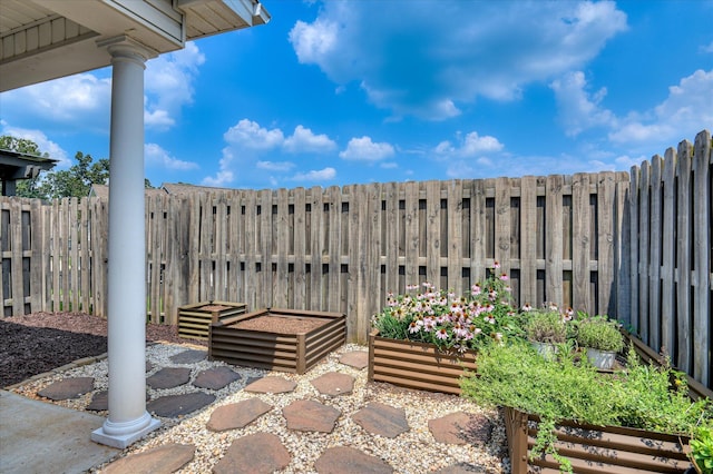 272 Harvester Dr, North Augusta, SC 29860 - view of patio / terrace featuring a garden