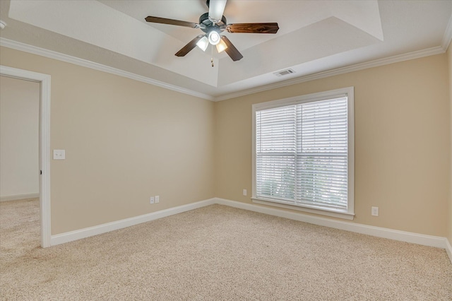 272 Harvester Dr, North Augusta, SC 29860 - carpeted empty room featuring a tray ceiling, crown molding, and a ceiling fan