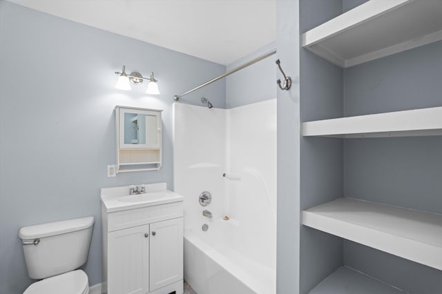 full bath featuring toilet, vanity, and shower / washtub combination