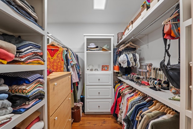 spacious closet with wood finished floors