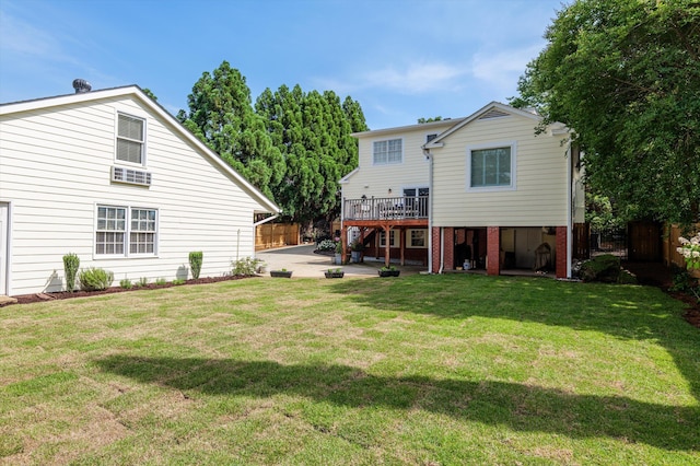 rear view of house featuring a deck, a patio, and stairs