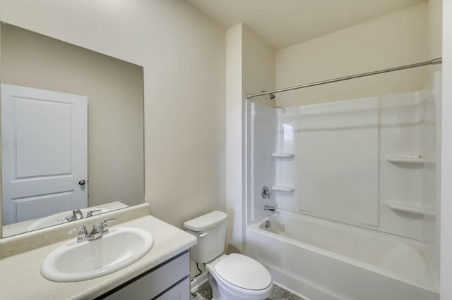 full bathroom featuring toilet, vanity, and washtub / shower combination