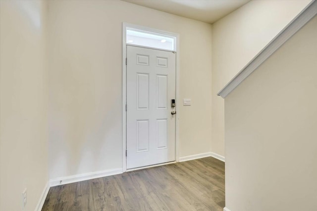 foyer entrance featuring light wood-type flooring