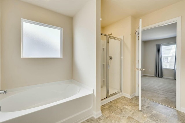 bathroom with independent shower and bath