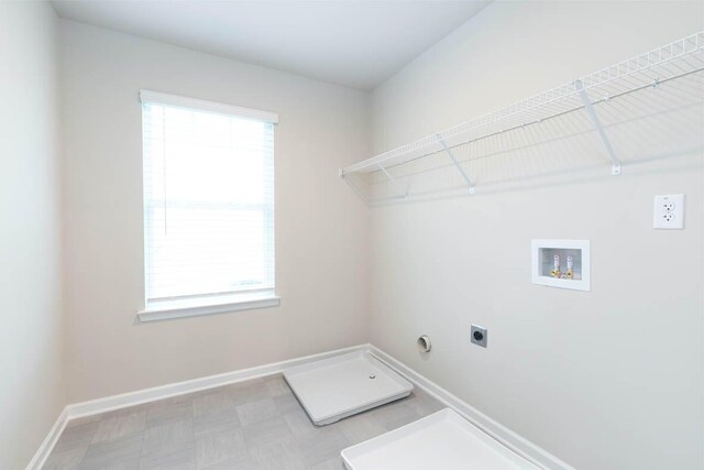 washroom featuring hookup for an electric dryer and washer hookup