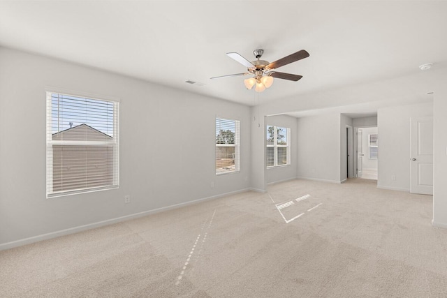 unfurnished bedroom with ceiling fan and light carpet