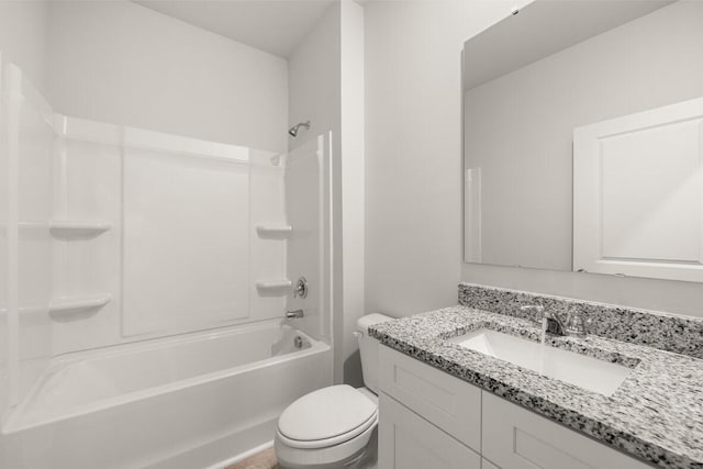 full bathroom with vanity,  shower combination, and toilet