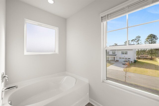 bathroom with a bathing tub