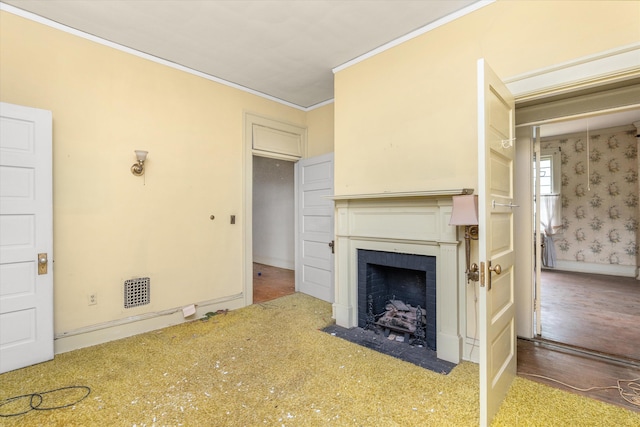 2131 Gardner St, Augusta, GA 30904 - unfurnished living room featuring a fireplace, ornamental molding, and wallpapered walls