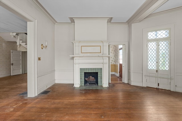 2131 Gardner St, Augusta, GA 30904 - unfurnished living room featuring hardwood / wood-style floors, a fireplace, wallpapered walls, crown molding, and baseboards