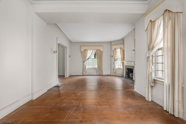 2131 Gardner St, Augusta, GA 30904 - unfurnished living room with ornamental molding, a fireplace with flush hearth, wood finished floors, and baseboards