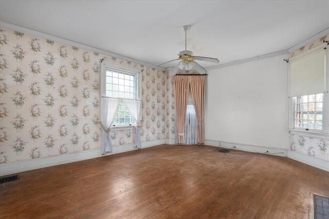 2131 Gardner St, Augusta, GA 30904 - spare room with wood finished floors, crown molding, baseboards, ceiling fan, and wallpapered walls