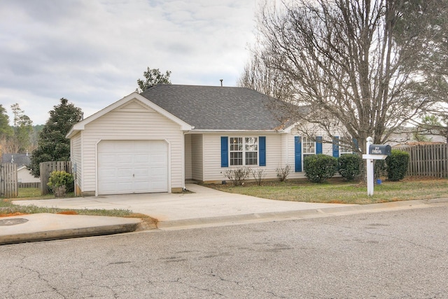 ranch-style home featuring a garage