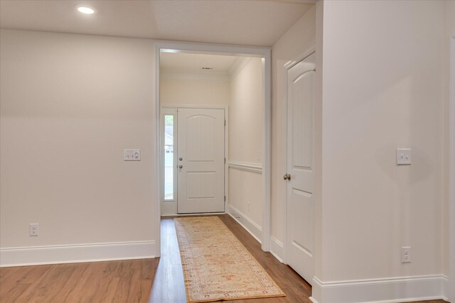 entryway featuring baseboards, recessed lighting, and dark wood finished floors