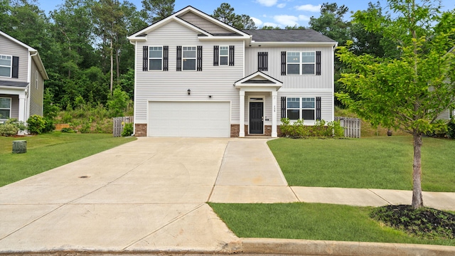 135 Lookout Loop, North Augusta, SC 29841 - view of front of home with an attached garage, driveway, a front lawn, board and batten siding, and brick siding