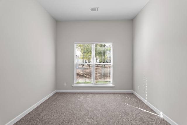 empty room with carpet floors