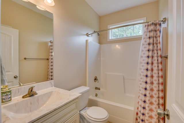 full bathroom featuring vanity, toilet, and shower / tub combo