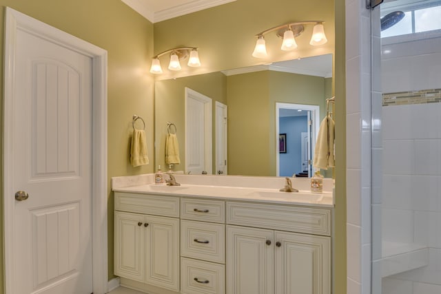 bathroom with vanity, crown molding, and walk in shower