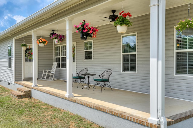 exterior space featuring ceiling fan and a porch