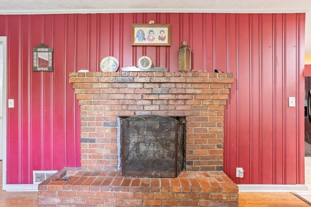 102 Briarcliff St, Belvedere, SC 29841 - detailed view of a brick fireplace and wood finished floors