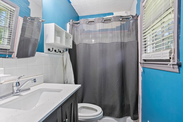 102 Briarcliff St, Belvedere, SC 29841 - bathroom featuring vanity, tile walls, and backsplash