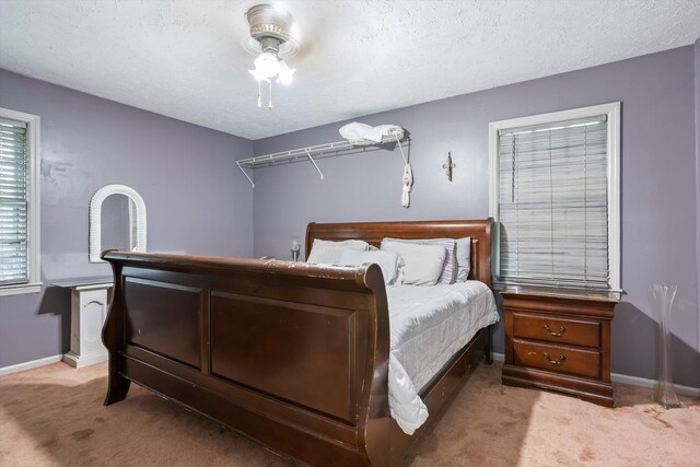 102 Briarcliff St, Belvedere, SC 29841 - carpeted bedroom with a ceiling fan and a textured ceiling