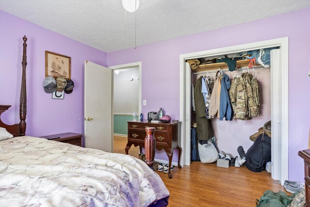 102 Briarcliff St, Belvedere, SC 29841 - bedroom with a closet, wood finished floors, and a textured ceiling