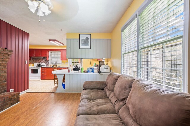 102 Briarcliff St, Belvedere, SC 29841 - living area with light wood-style floors, plenty of natural light, and a ceiling fan