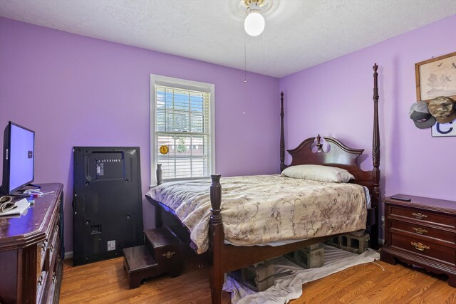 102 Briarcliff St, Belvedere, SC 29841 - bedroom featuring wood finished floors and a textured ceiling