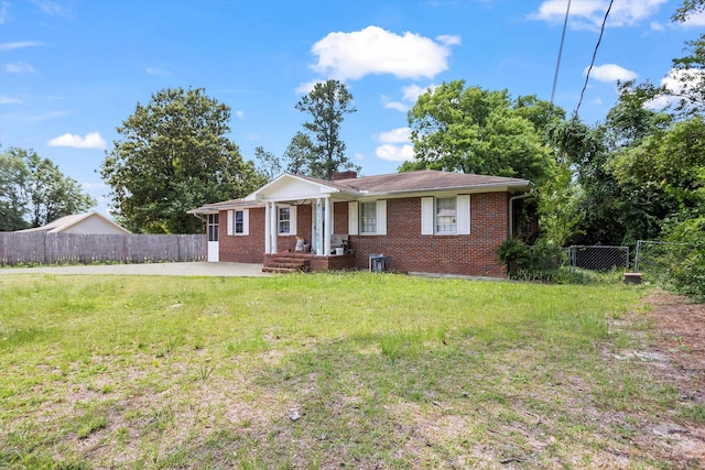 102 Briarcliff St, Belvedere, SC 29841 - view of front of property with brick siding, a chimney, and a fenced backyard