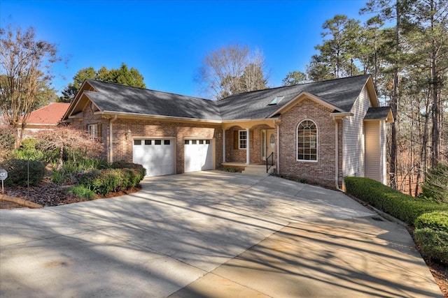 ranch-style house featuring a garage