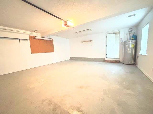 526 Timberchase Ln, Aiken, SC 29803 - garage featuring water heater