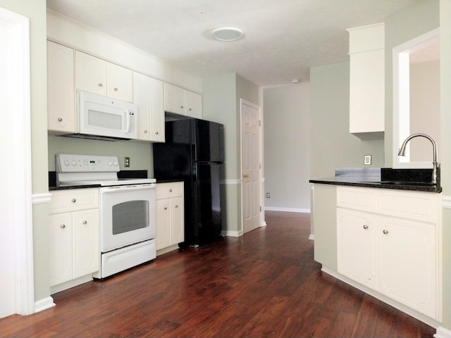 526 Timberchase Ln, Aiken, SC 29803 - kitchen featuring white appliances, a sink, dark countertops, and dark wood finished floors