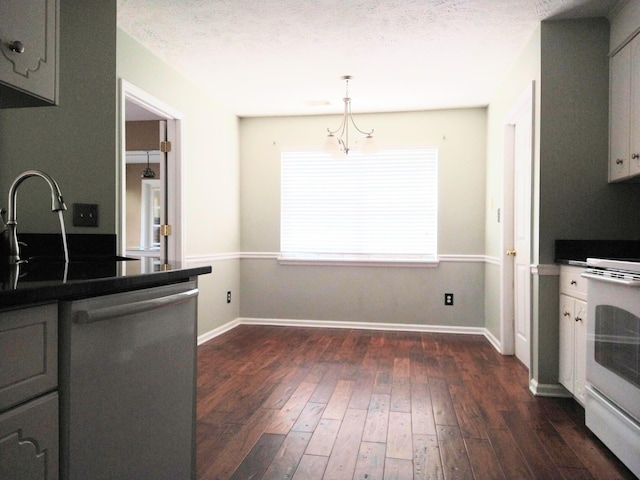 526 Timberchase Ln, Aiken, SC 29803 - kitchen with dishwasher, dark countertops, dark wood-style flooring, white electric range, and a textured ceiling