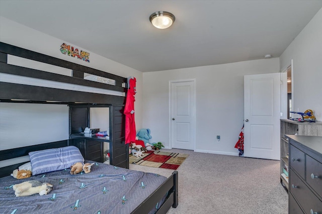 bedroom with light colored carpet