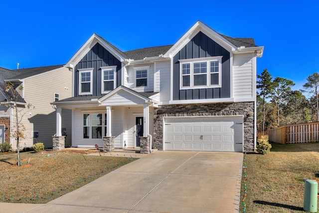 view of front facade featuring a front yard and a garage