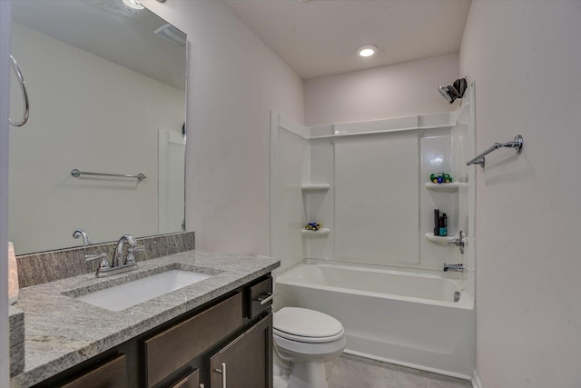 full bathroom featuring tile patterned floors, vanity,  shower combination, and toilet