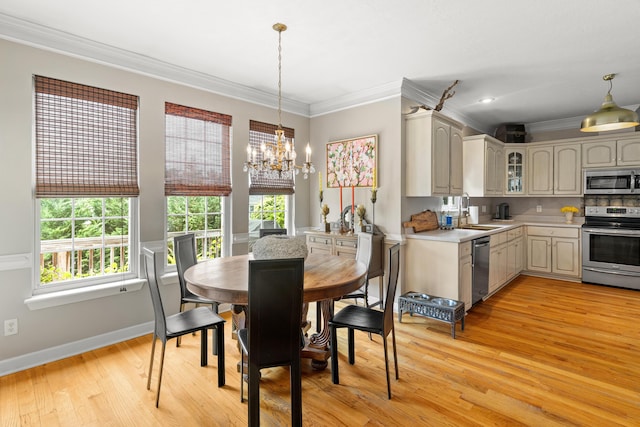 3637 Foxfire Pl, Martinez, GA 30907 - dining area featuring a chandelier, light wood finished floors, crown molding, and baseboards