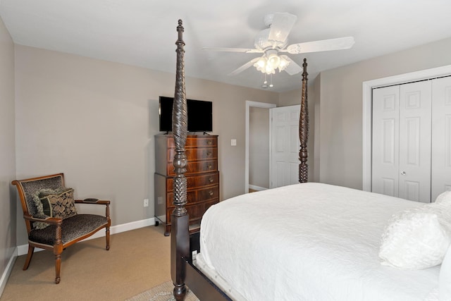 3637 Foxfire Pl, Martinez, GA 30907 - bedroom with light carpet, a closet, baseboards, and a ceiling fan