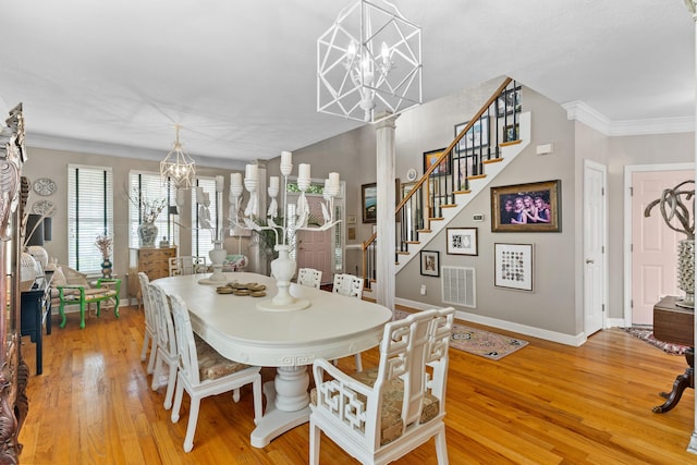 3637 Foxfire Pl, Martinez, GA 30907 - dining area featuring baseboards, light wood finished floors, stairs, ornamental molding, and a chandelier