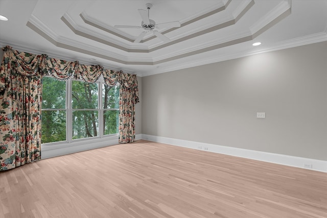 3997 Hammonds Fry, Evans, GA 30809 - empty room with crown molding, a tray ceiling, light wood-style floors, ceiling fan, and recessed lighting
