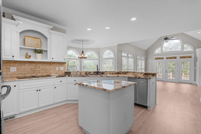 3997 Hammonds Fry, Evans, GA 30809 - kitchen with light wood-style flooring, dishwasher, a peninsula, a center island, and white cabinetry