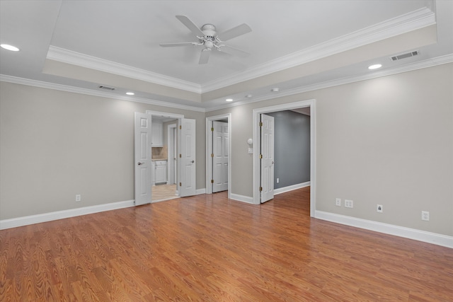 3997 Hammonds Fry, Evans, GA 30809 - unfurnished room featuring a raised ceiling, ceiling fan, light wood-style floors, crown molding, and recessed lighting